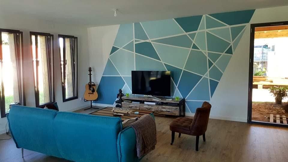Décoration murale géométrique bleue réalisée par Atelier Nuance